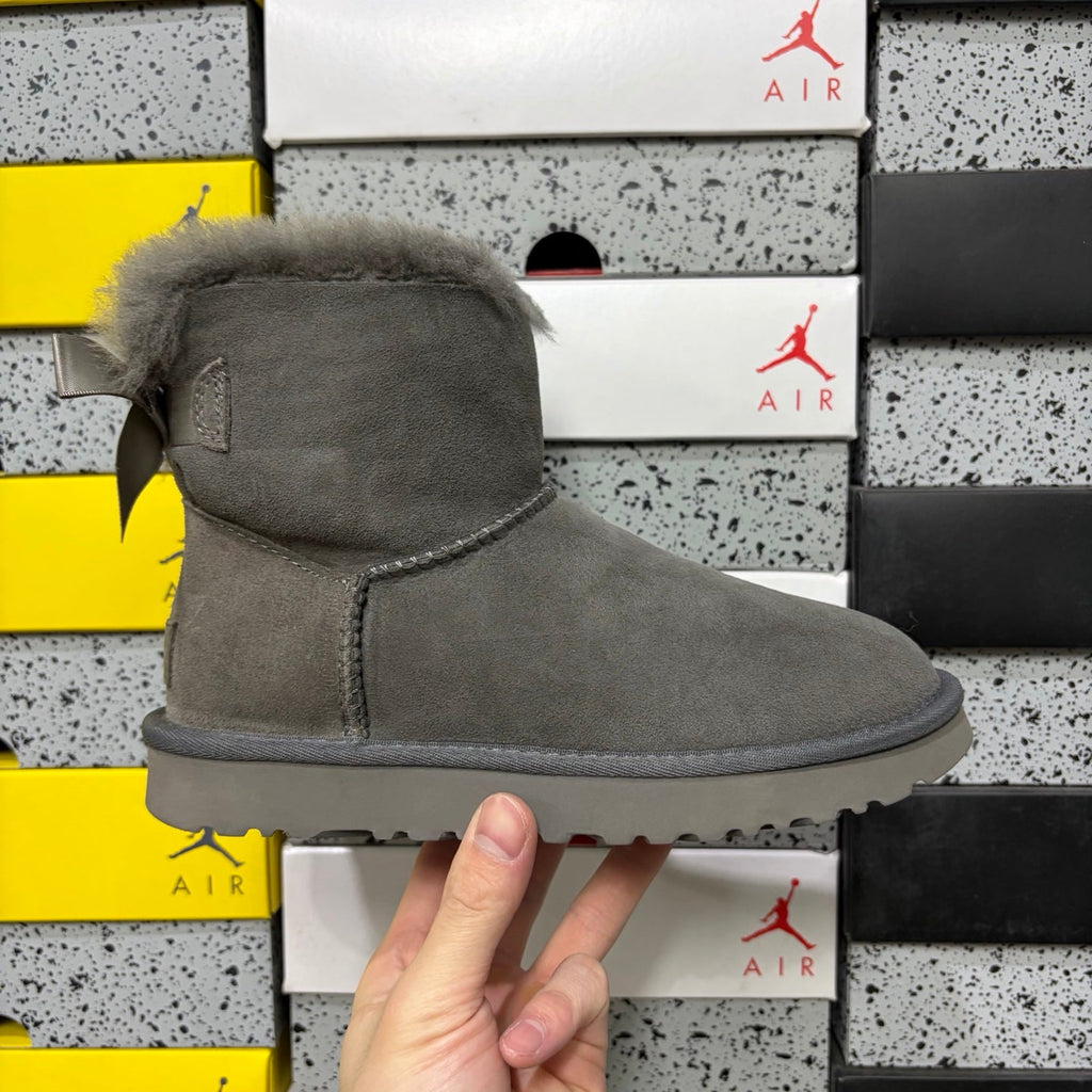 UGG Mini Bailey Bow Ankle Boot – Suede Boot with Tonal Grey Shearling Lining, Grey Satin Bow & Grey Lug Sole in Grey
