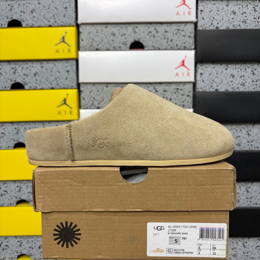 UGG Suede Mule – Women’s Backless Clog with Gold Rivet Accents & Shearling Lining in Sand