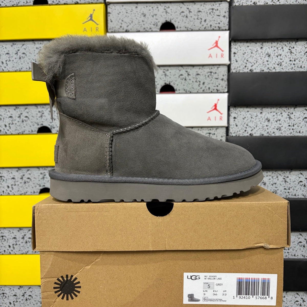UGG Mini Bailey Bow Ankle Boot – Suede Boot with Tonal Grey Shearling Lining, Grey Satin Bow & Grey Lug Sole in Grey