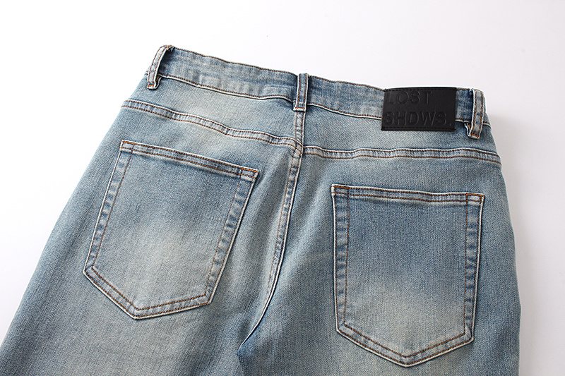LOSTSHDWS Light Blue Flower Applique Flared Jeans