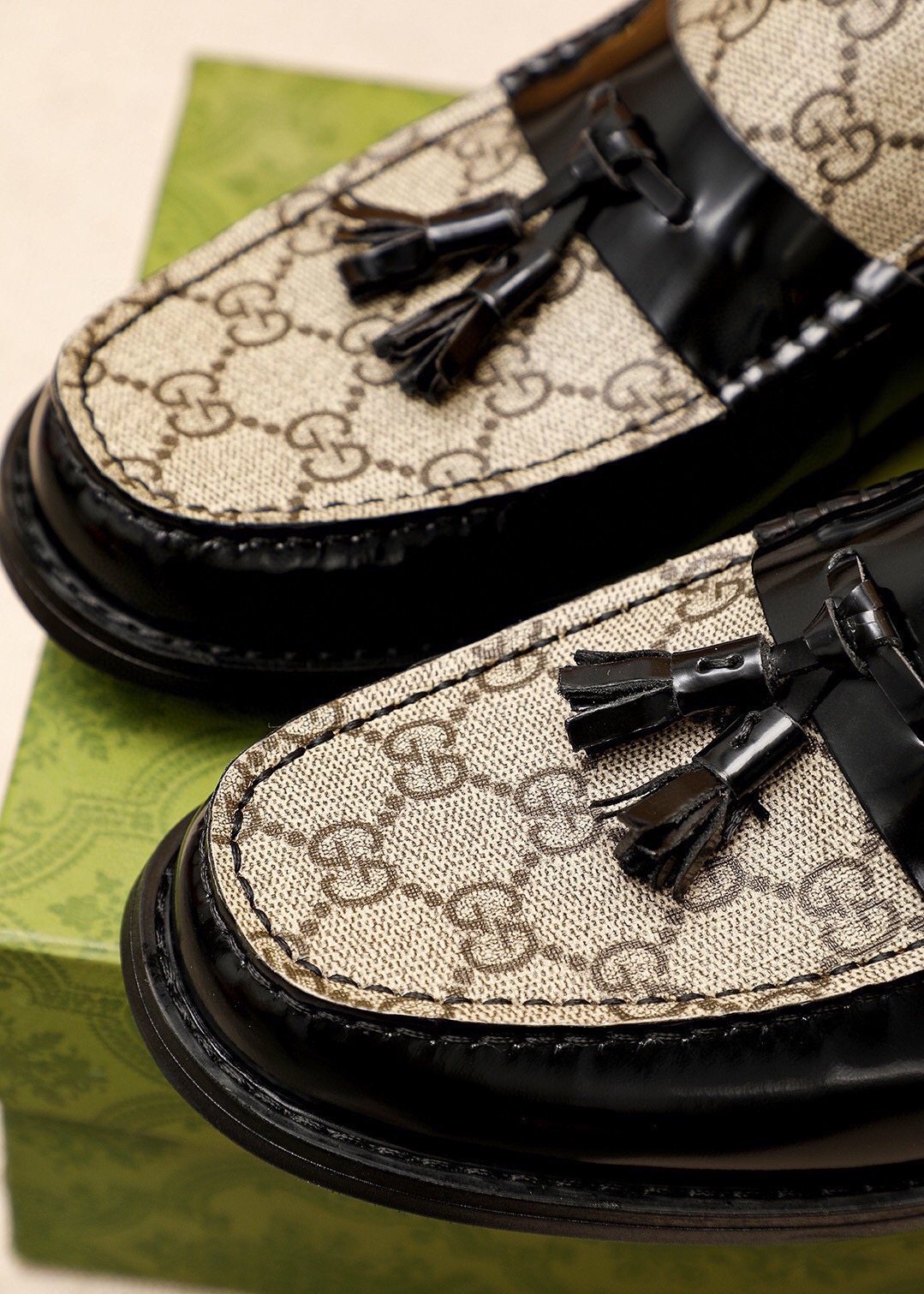 Gucci Tassel Monogram Loafers